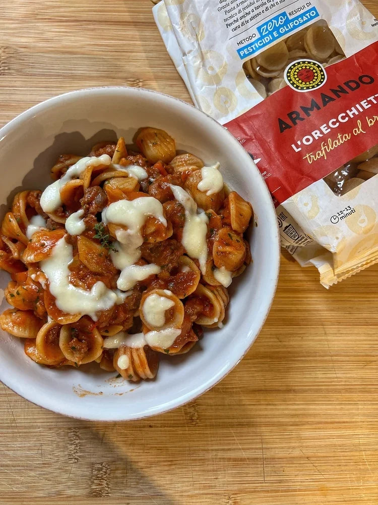 Orecchiette con ragù di salsiccia e crema di pecorino